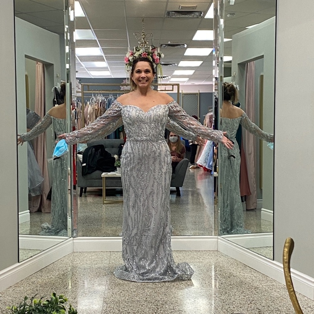 Elegant formal dress with detachable train. Brand new never been worn or altered